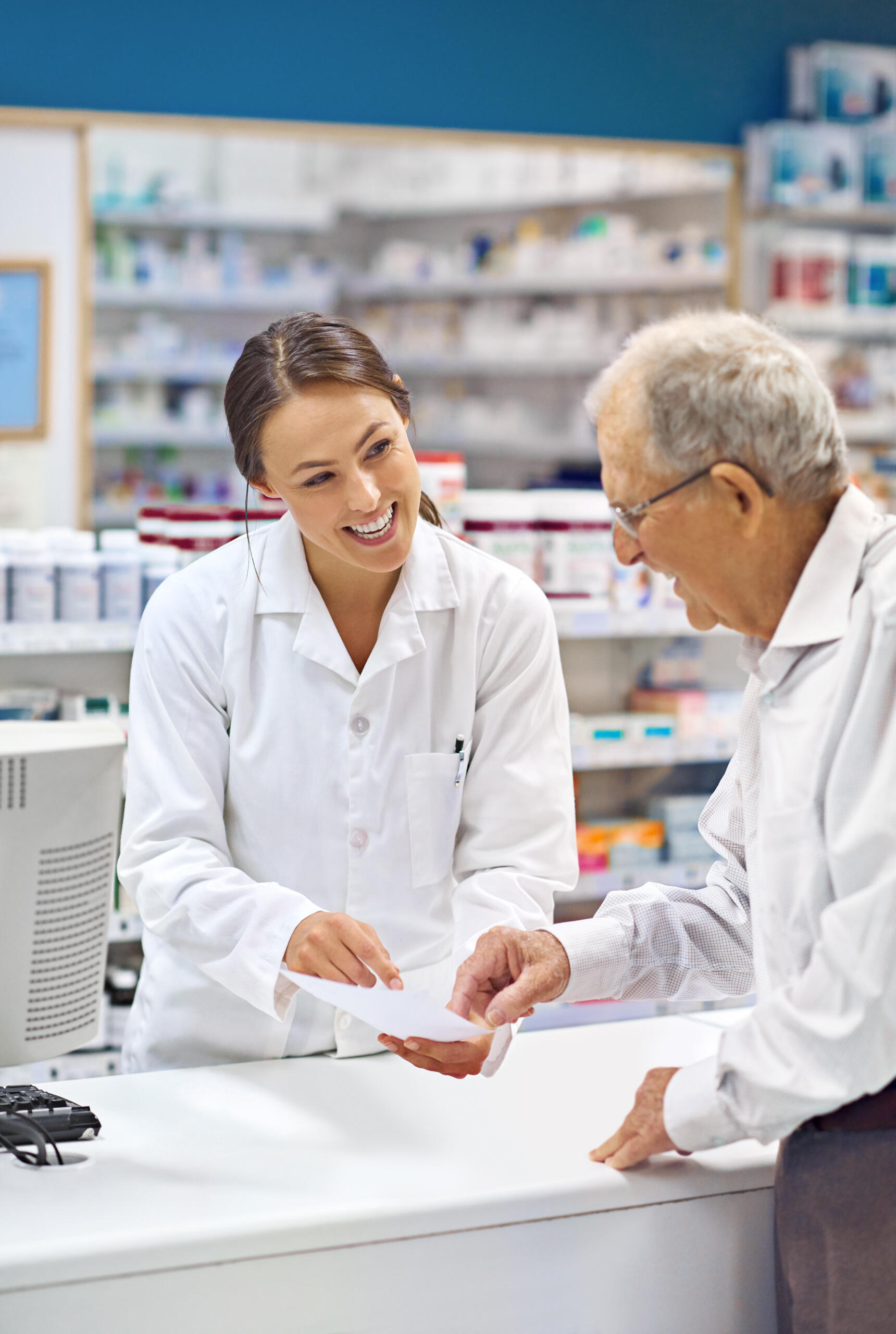 pharmacist helping customer